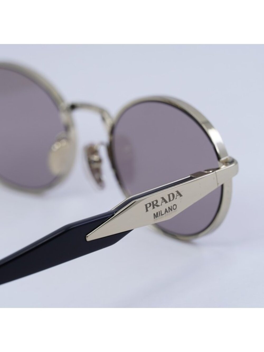 Prada PR65ZS ZVN20I Sunglasses Pale Gold Oval Frame, Light Purple Brown Lenses - Picture 8 of 12